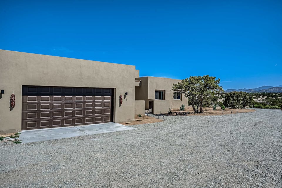 A welcoming Southwestern entry with cactus and adobe charm