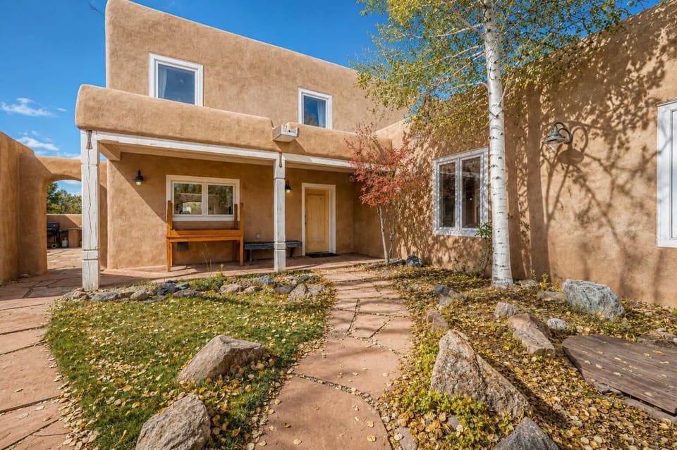 Step through the walled courtyard into the heart of the home.