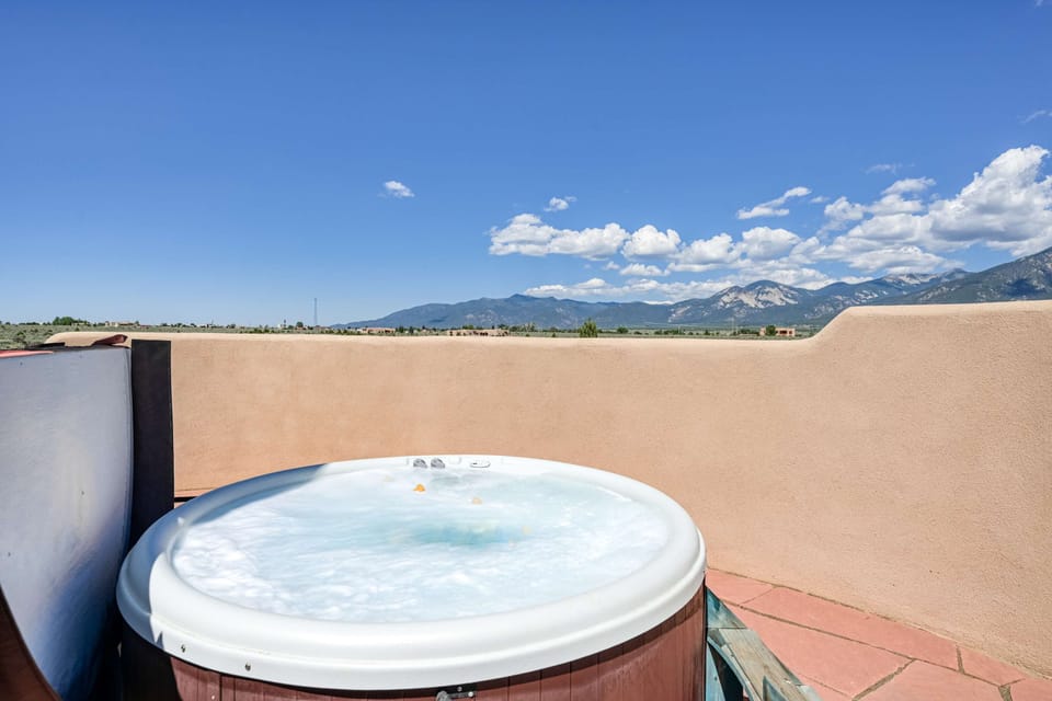 Unwind in the hot tub with open mountain views