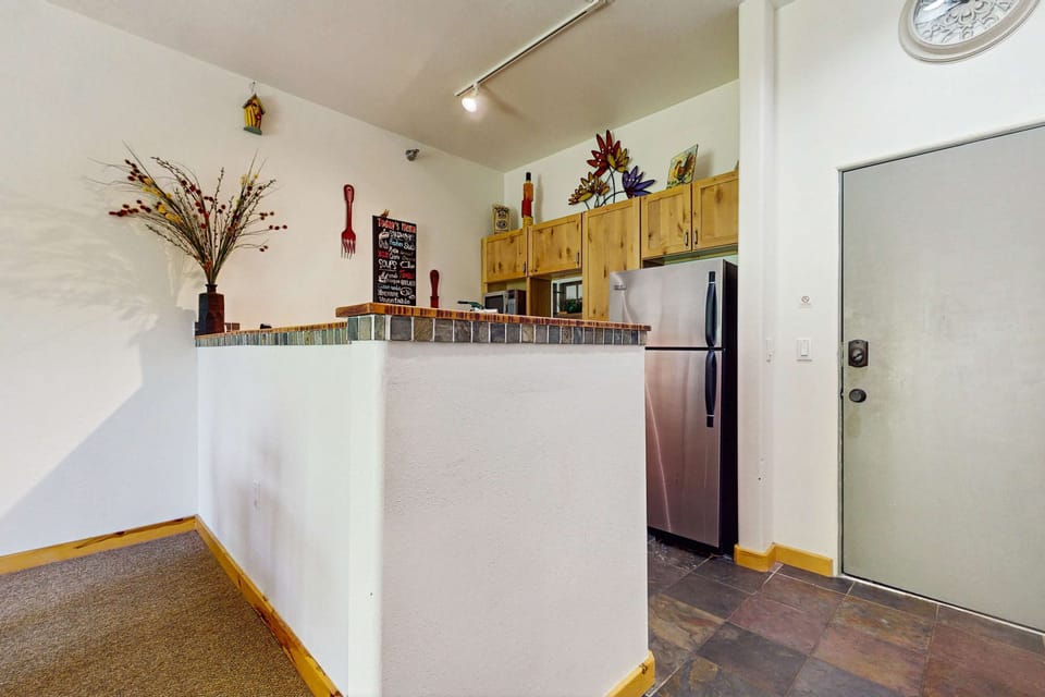 Step inside to a welcoming entry that opens to the kitchen and living space