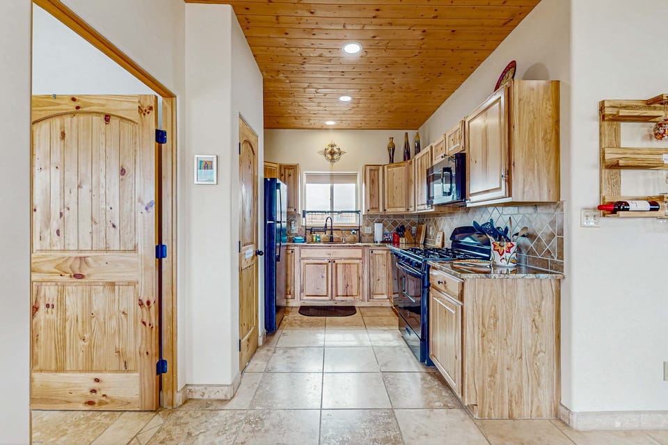 Whip up meals in the full kitchen with a gas range and granite counters