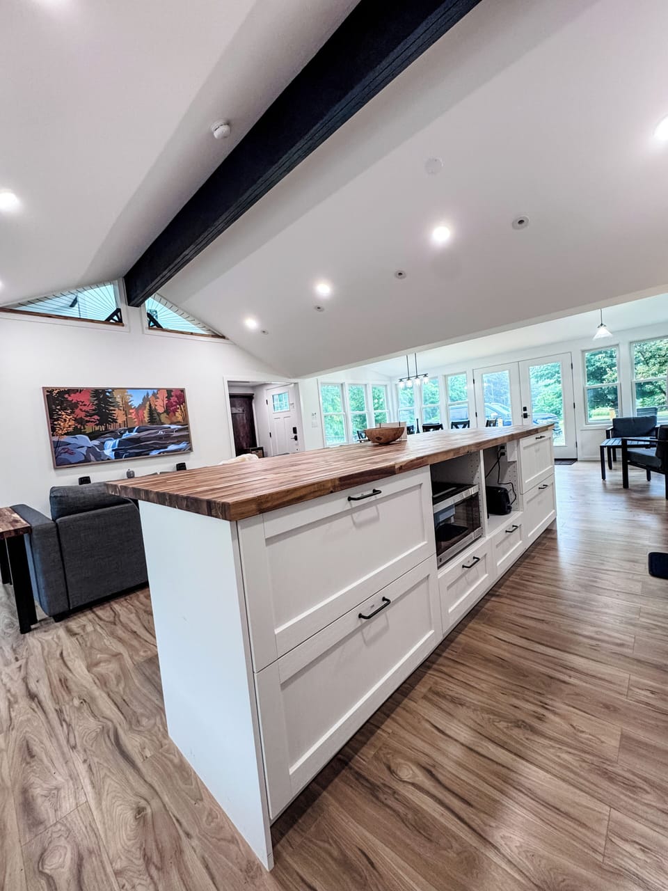 The Cottage at Quill Hollow kitchen and living room.
