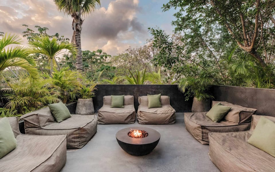 Gather around the fire pit as the sun goes down.