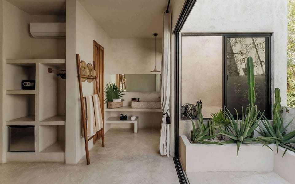 Open shelving, natural textures, and plenty of light for a clean, airy feel.