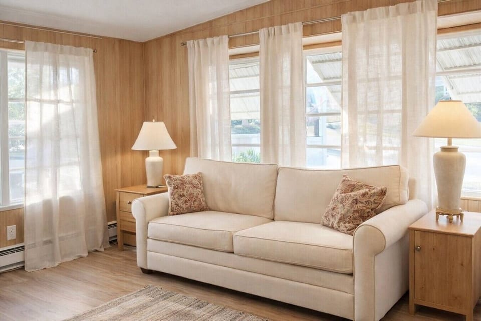 Bright and cozy living room, perfect for relaxing after a day exploring Sarasota.