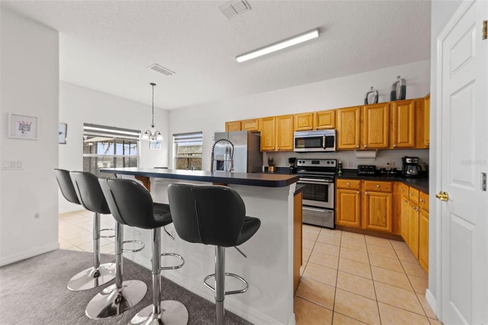 Full Kitchen with bar seating. Separate dining room table not pictured.