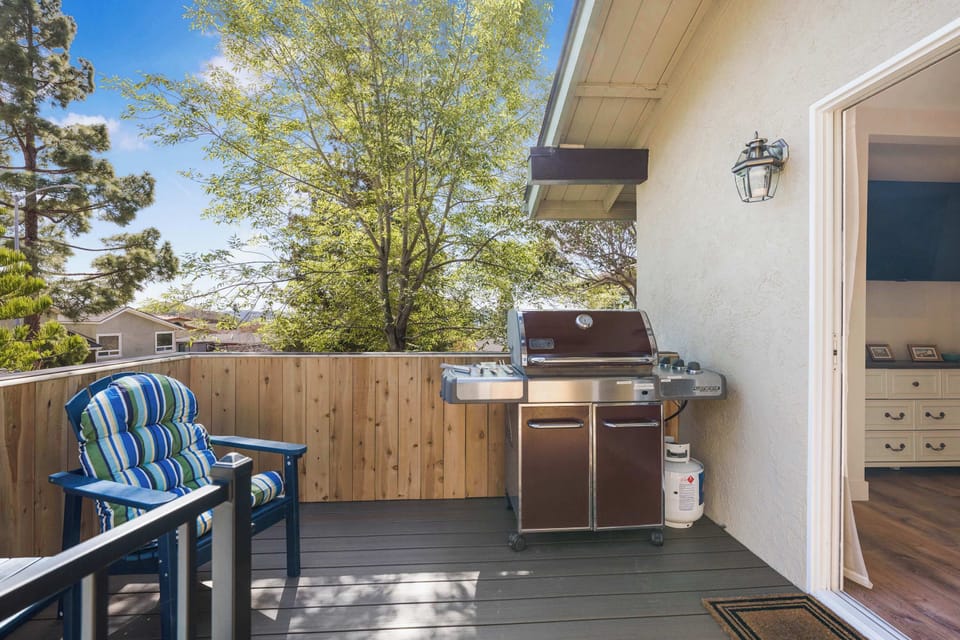 BBQ and lounge chairs on the deck