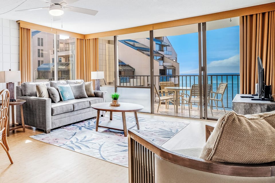 Spacious ocean view living room with sleeper sofa