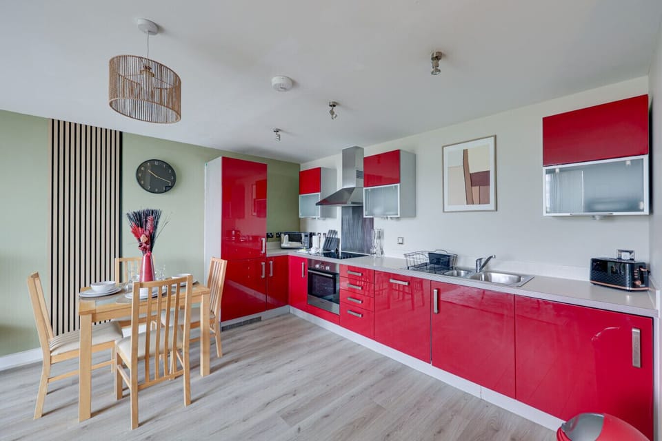 Fully equipped kitchen with a full size fridge-freezer along with a dishwasher and washing machine.