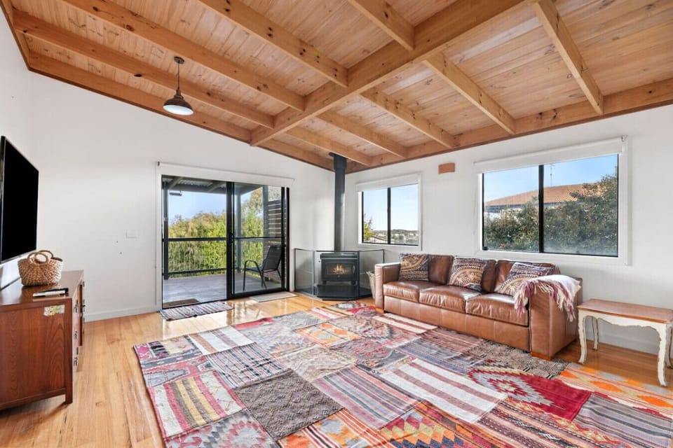 Cozy living space with warm wood and sunlight