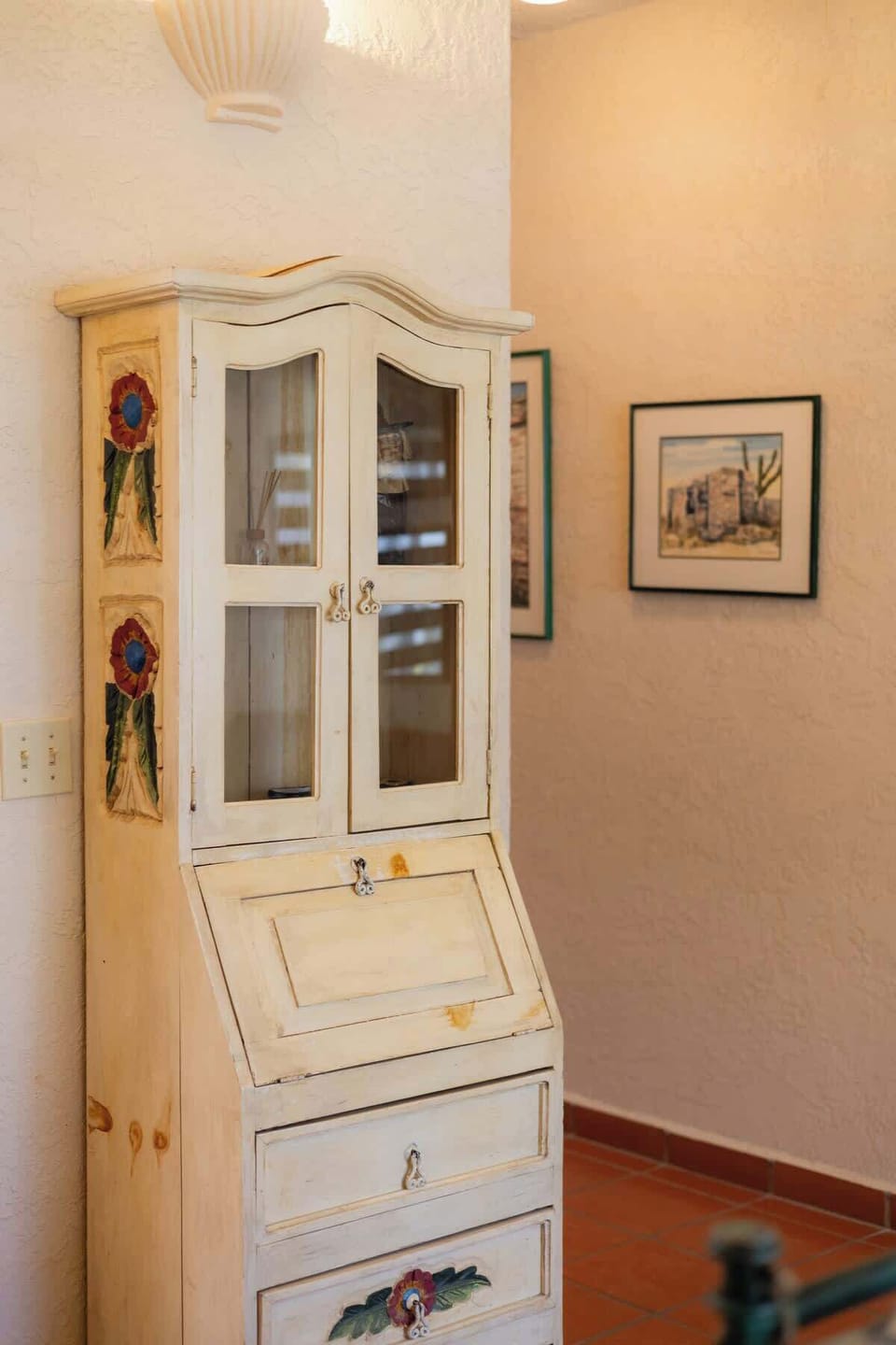Small storage nook w/ cabinet space & display shelving