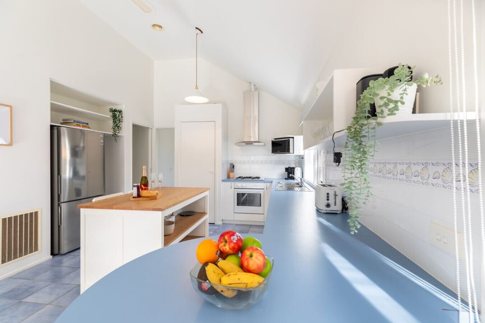 Modern kitchen with ample counter space and appliances