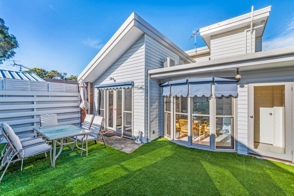 Private lawn with outdoor dining — your perfect post-beach unwind zone.
