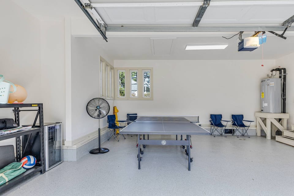 Enjoy friendly competition in the garage with ping pong and other games. 8 beach chairs, umbrella and googie board