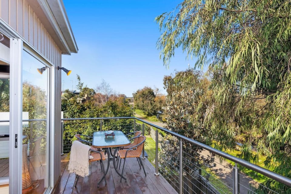 Lovely timber balcony with a peaceful treetop setting