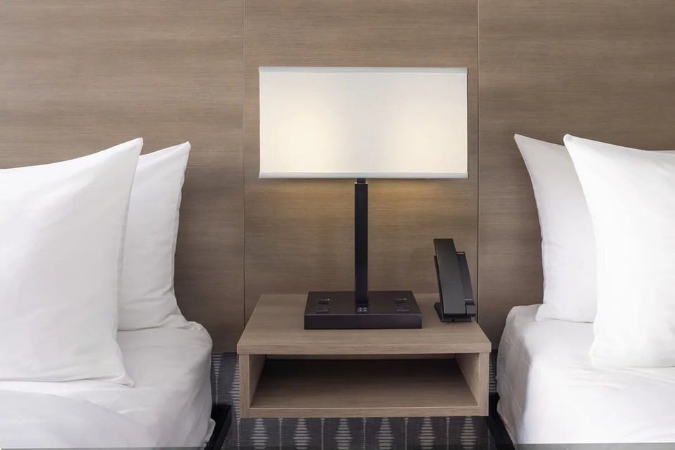 Stretch out in a bright double-queen room made for rest.