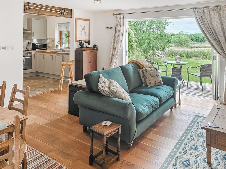 Lounge view over marshes. | Little Marsh, Aldeby