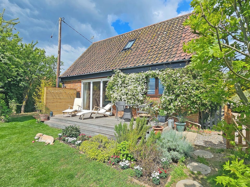 South facing deck is a sun trap with wonderful views | Little Marsh, Aldeby