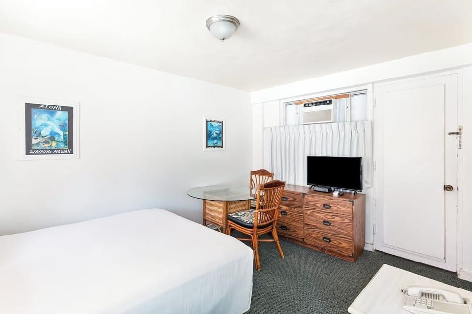 Settle in with in-room entertainment and practical storage space.