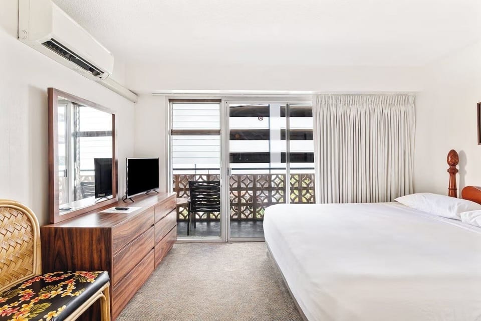 Lounge in comfort with balcony views and roomy sleeping space.