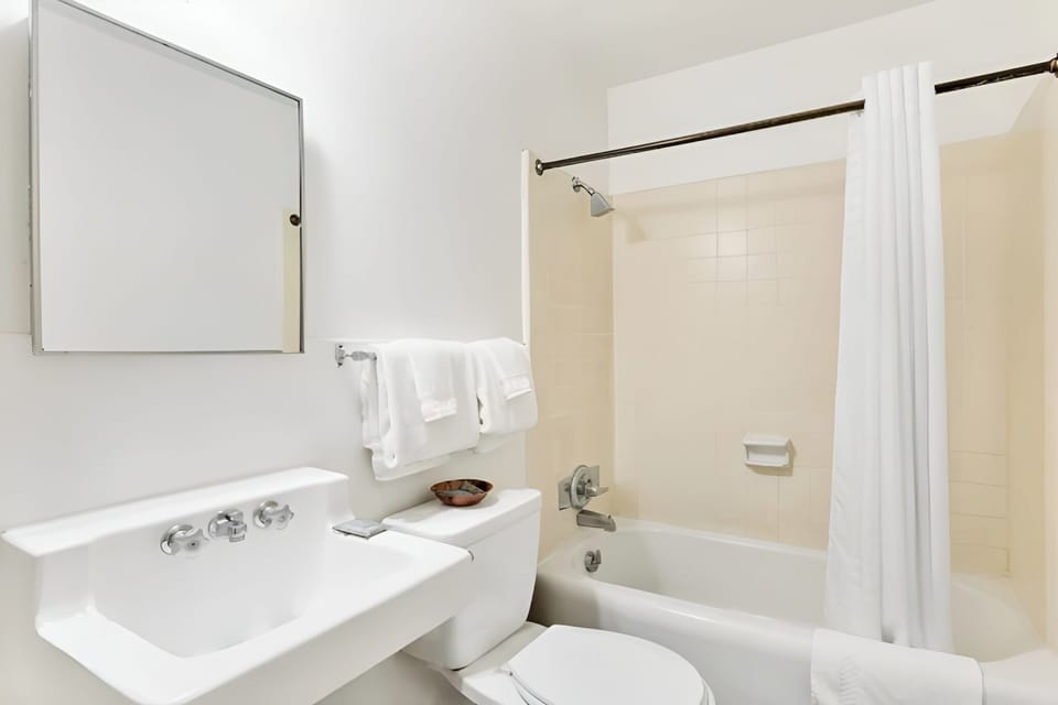 Start mornings fresh with bright vanity space and fluffy towels.