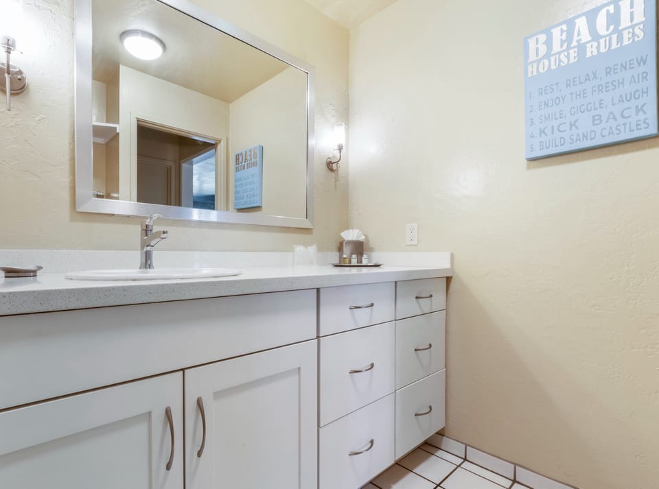 Get ready effortlessly with bright lighting and a clean countertop.