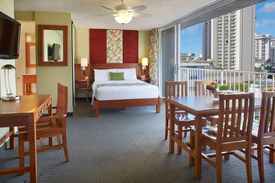 Spread out in this airy studio with dining and balcony access
