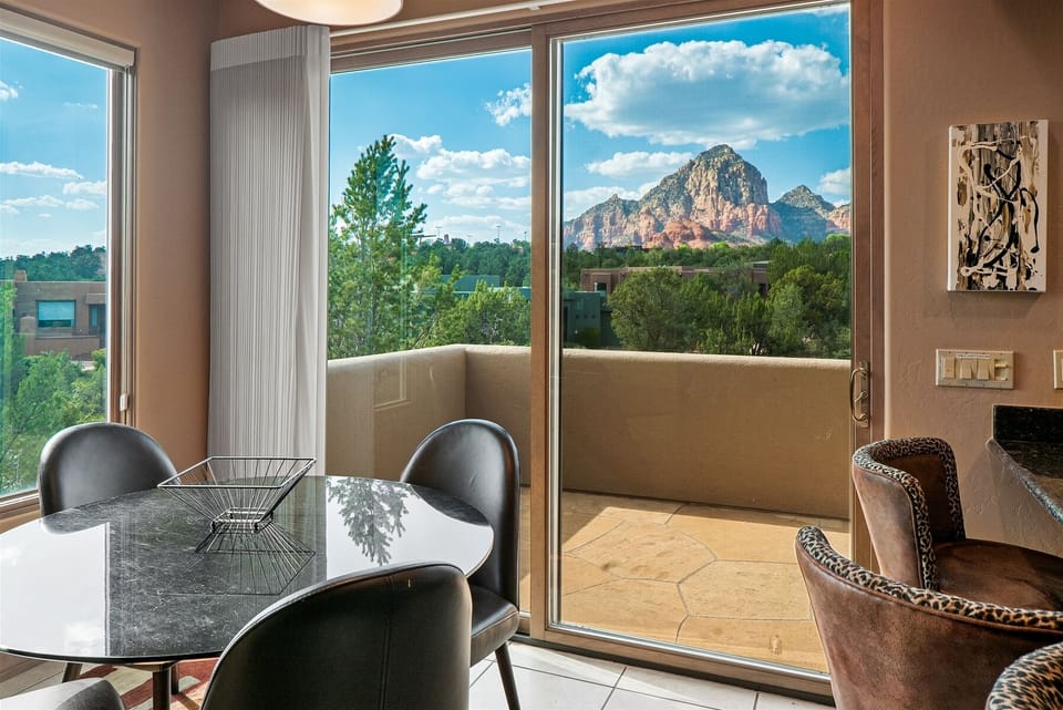 There is a casual dining area and access to the patio