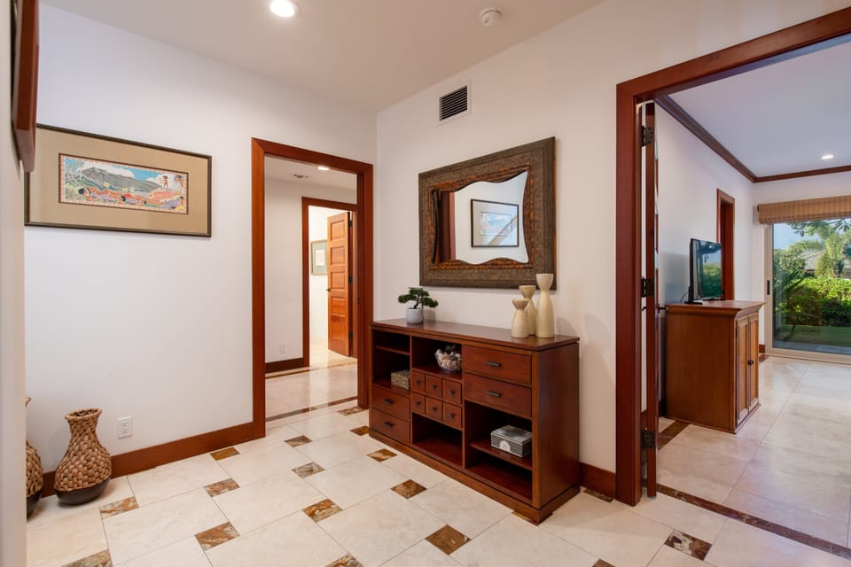 Downstairs landing, beautiful tile flooring throughout the home