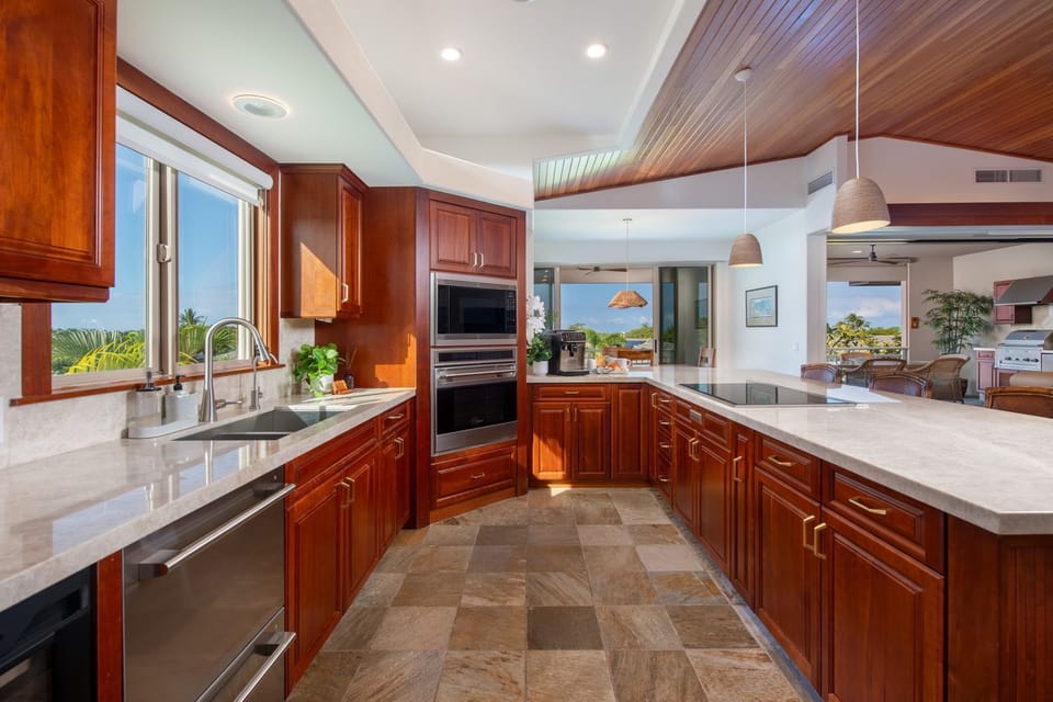 Gourmet Kitchen with high end appliances and wine fridge