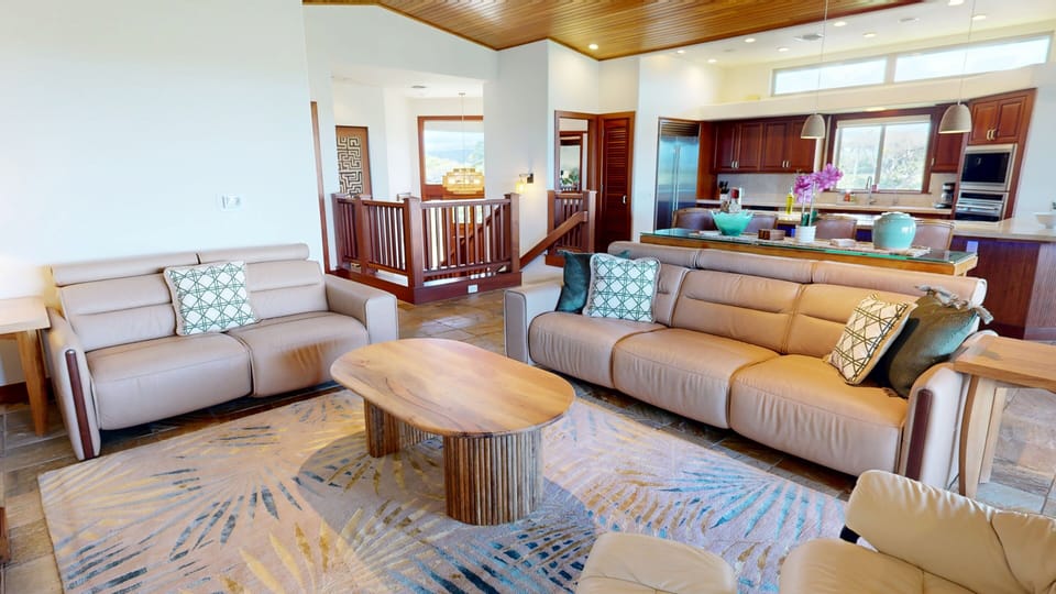 Spacious open-concept  living room with comfortable seating