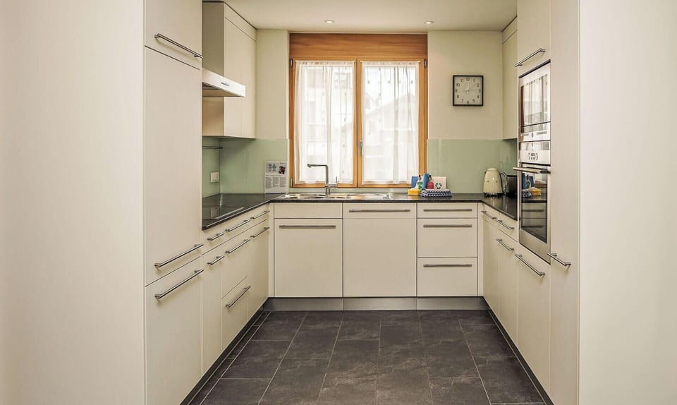 Kitchen, Countertop, Kitchen Appliance, Cabinetry, Flooring, Interior Design, Wood, Floor, Major Appliance, Furniture