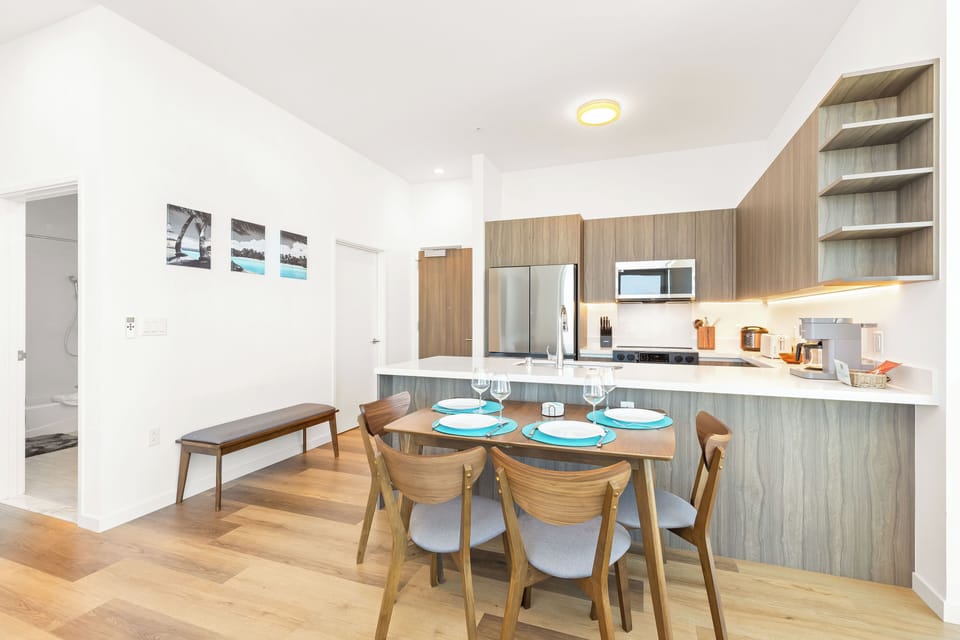 Enjoy the convenience of a large kitchen island paired with a di