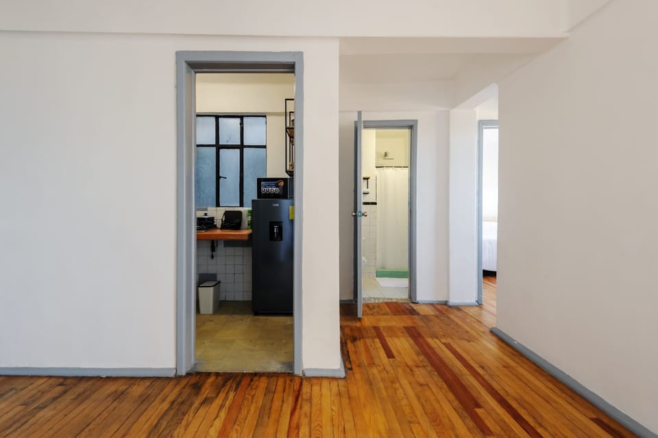 Corridor leading to the kitchen and bathroom