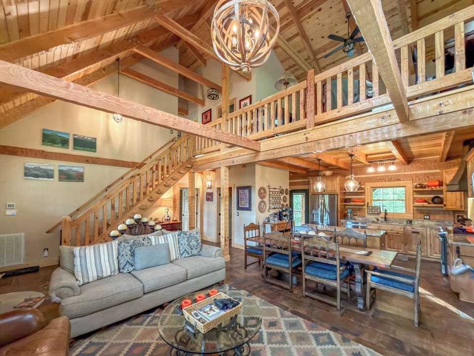 The craftmanship of hand-hewn logs shines in the great room.