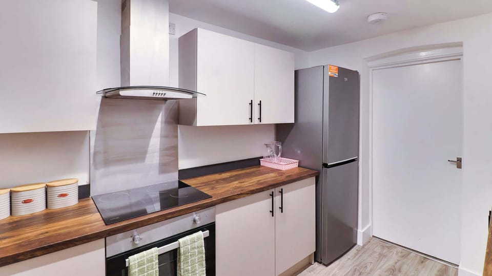 A modern kitchen layout gives you plenty of space to cook, prepare and store everything you need during your stay.