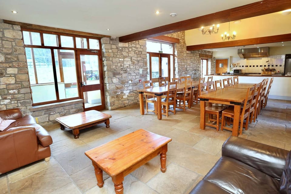 Spacious dining room and kitchen perfect for large groups to enjoy.