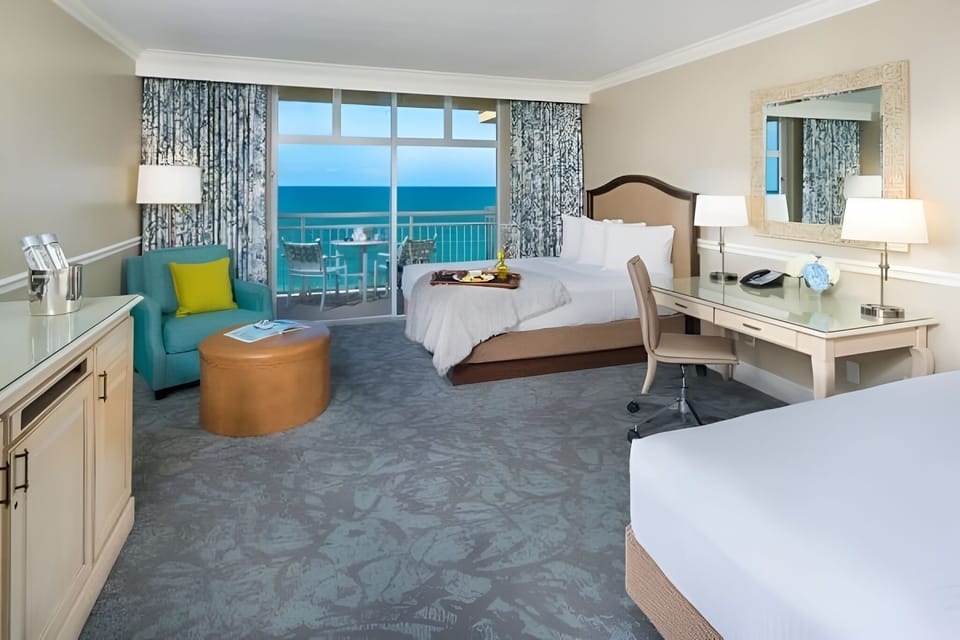 Step into sunlit comfort and breathe in oceanfront serenity.