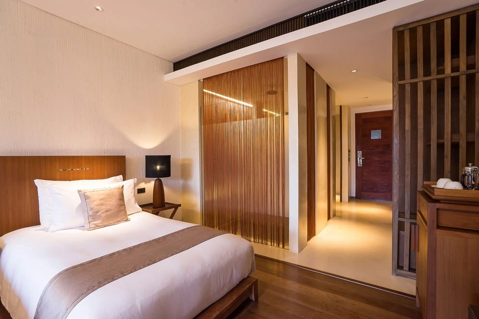 Unwind in crisp linens after a day of exploring.