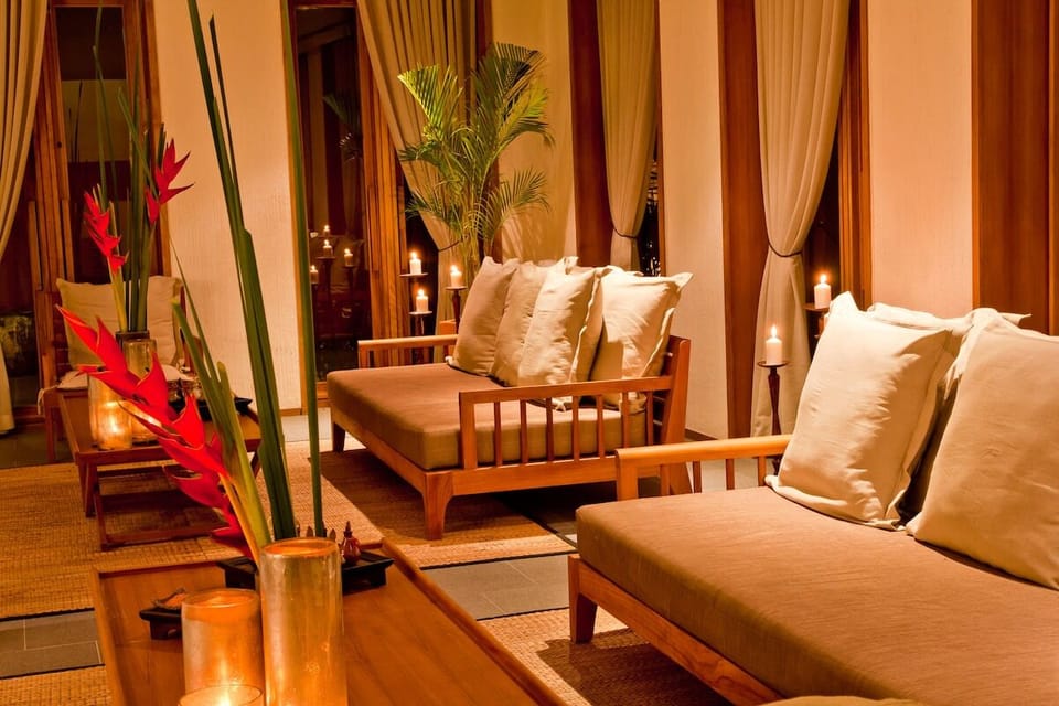 Settle into plush seating as candlelight sets the mood.