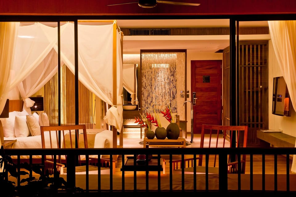 Gather for drinks in a warmly lit, open-plan suite.