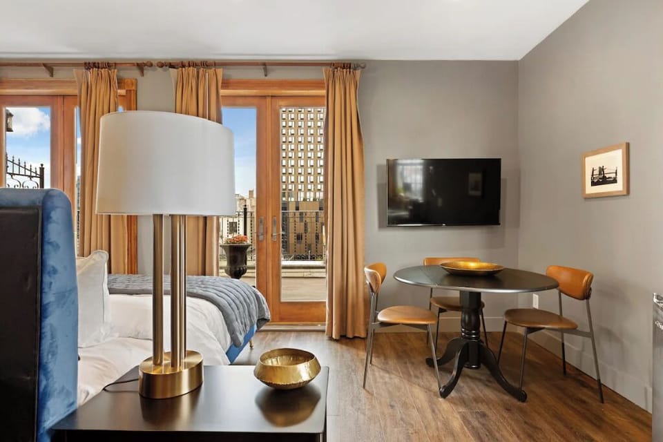 Enjoy a cozy in-room meal with TV entertainment nearby.