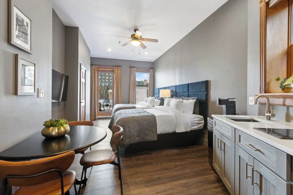 Fix snacks easily with a sleek kitchenette right in-suite.