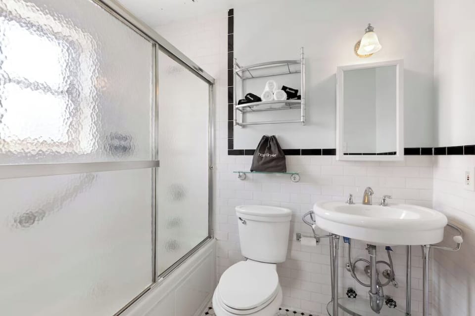 Refresh easily in a bright bath with deep soaking tub.
