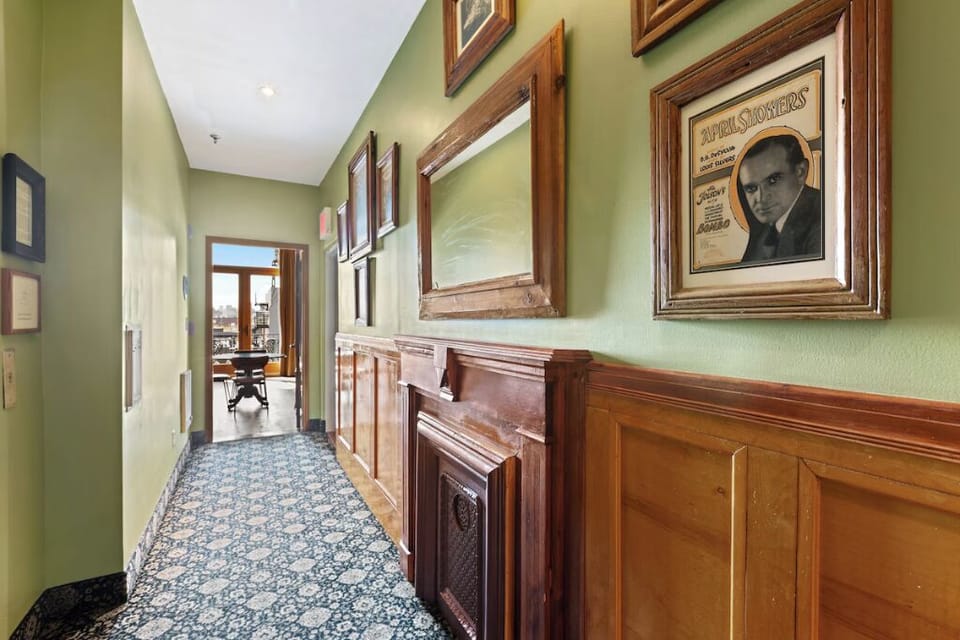 Wander down art-lined hallways that feel warm and historic.