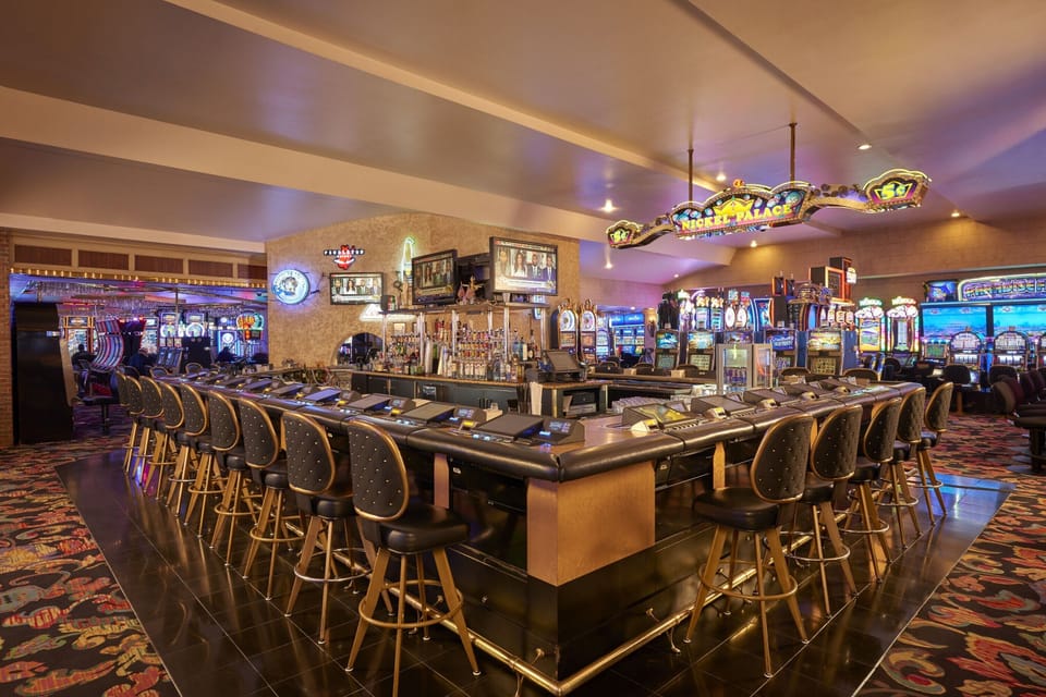 Gather around the bar for late-night laughs and cocktails.