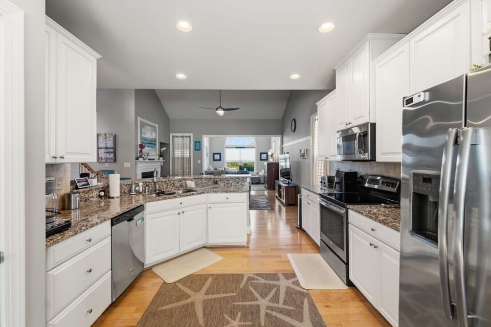 Kitchen | Stainless Steel Appliances | Open Layout & Breakfast Bar