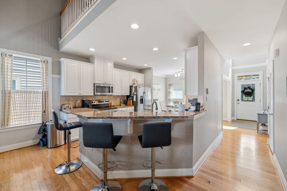 Kitchen | Breakfast Bar | Loft View & Hardwood Floors