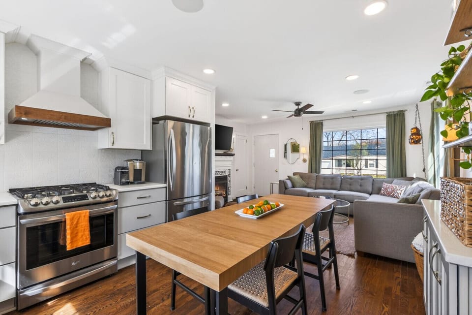 Experience seamless living in this expansive open-concept space, where the stylish kitchen flows effortlessly into a comfortable living area.