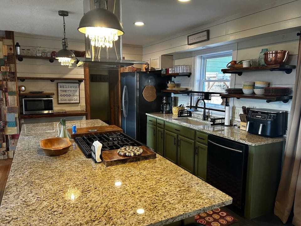 This amazing, spacious kitchen features a large center island, the ideal place to create lasting memories with family and friends.